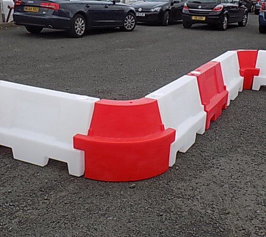 red and white barrier snake