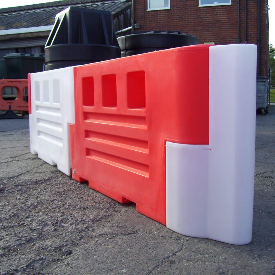 red and white barriers side on
