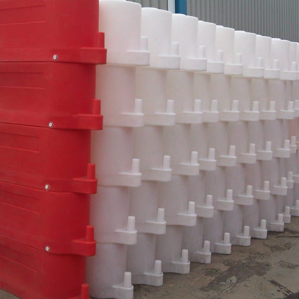 red and white stacked fence blocks