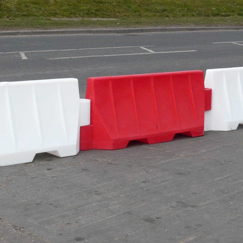 red and white barrier side of road 2