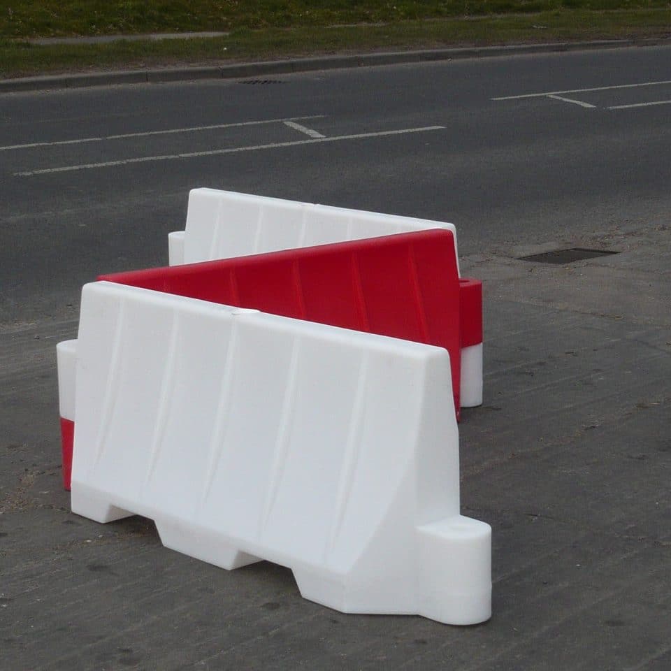 red and white barrier zig zag