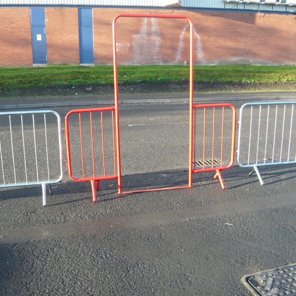 red fence with doorway