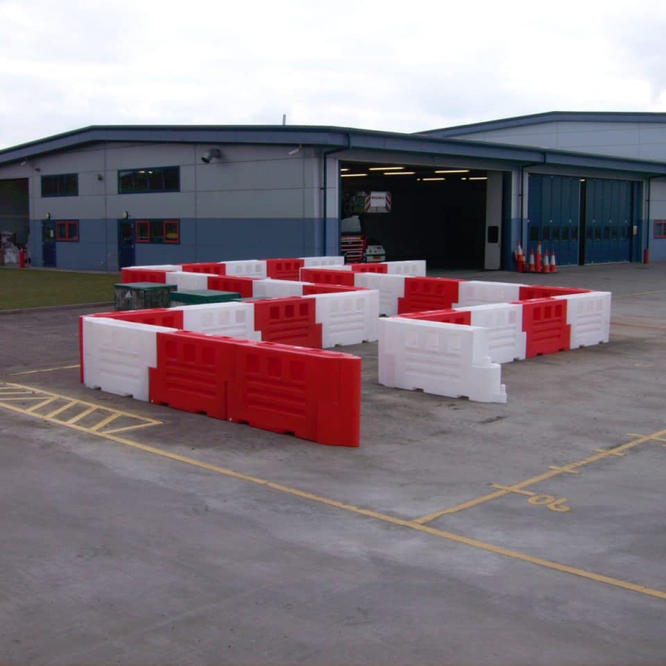 red and white barrier path