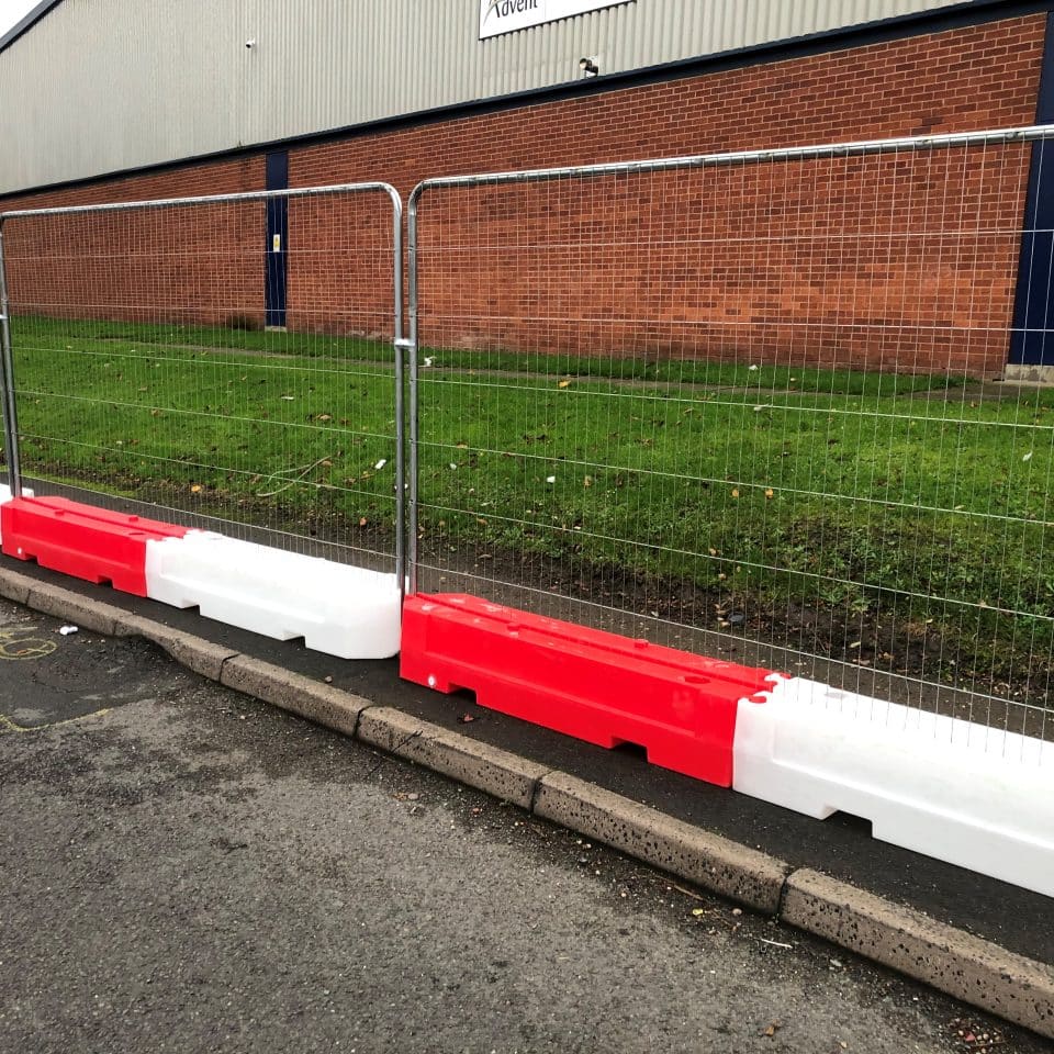 red and white low fence blocks with fence