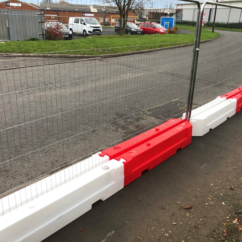 red and white low fence blocks with fence