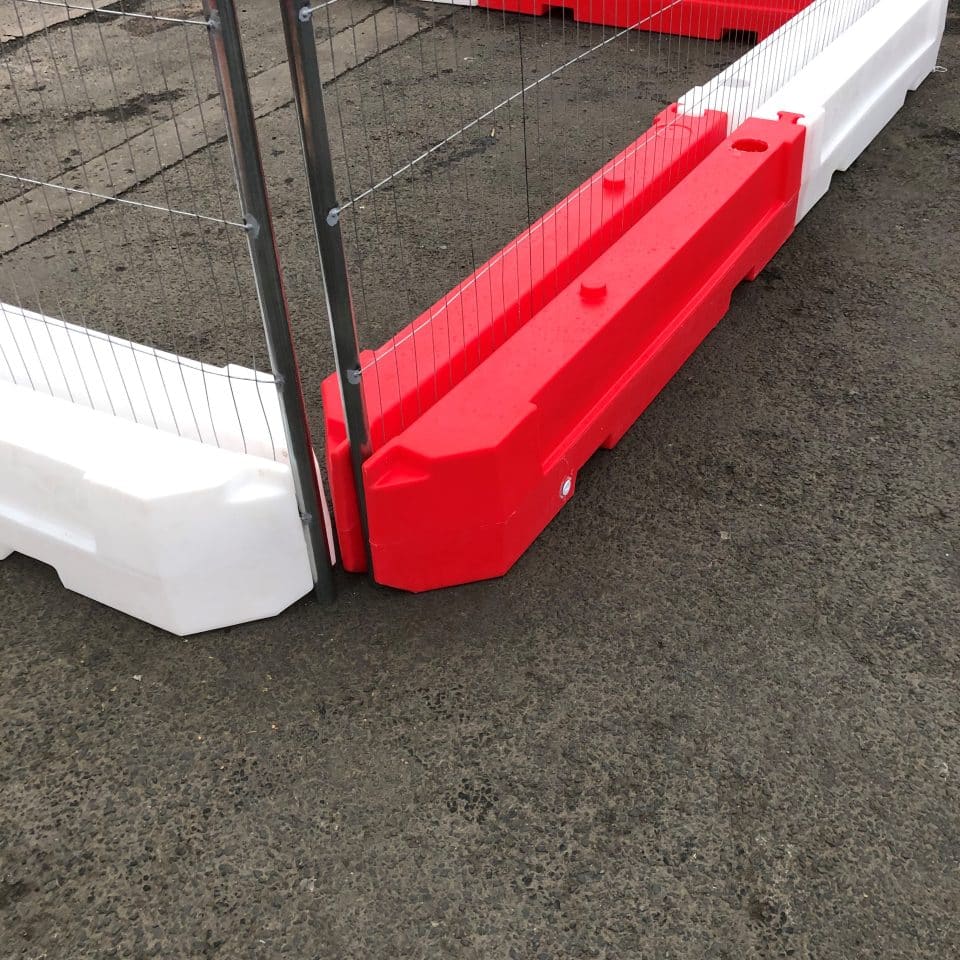 red and white low fence blocks with fence