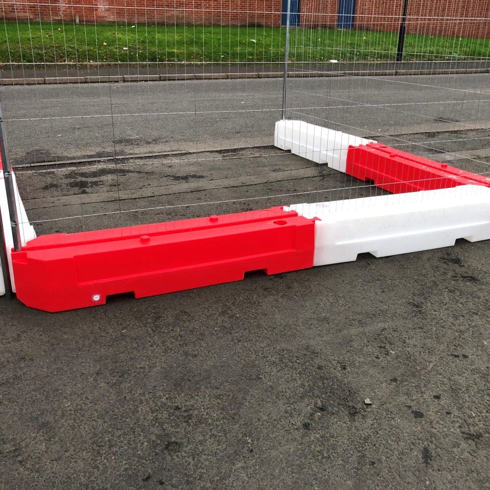 red and white low fence blocks with fence