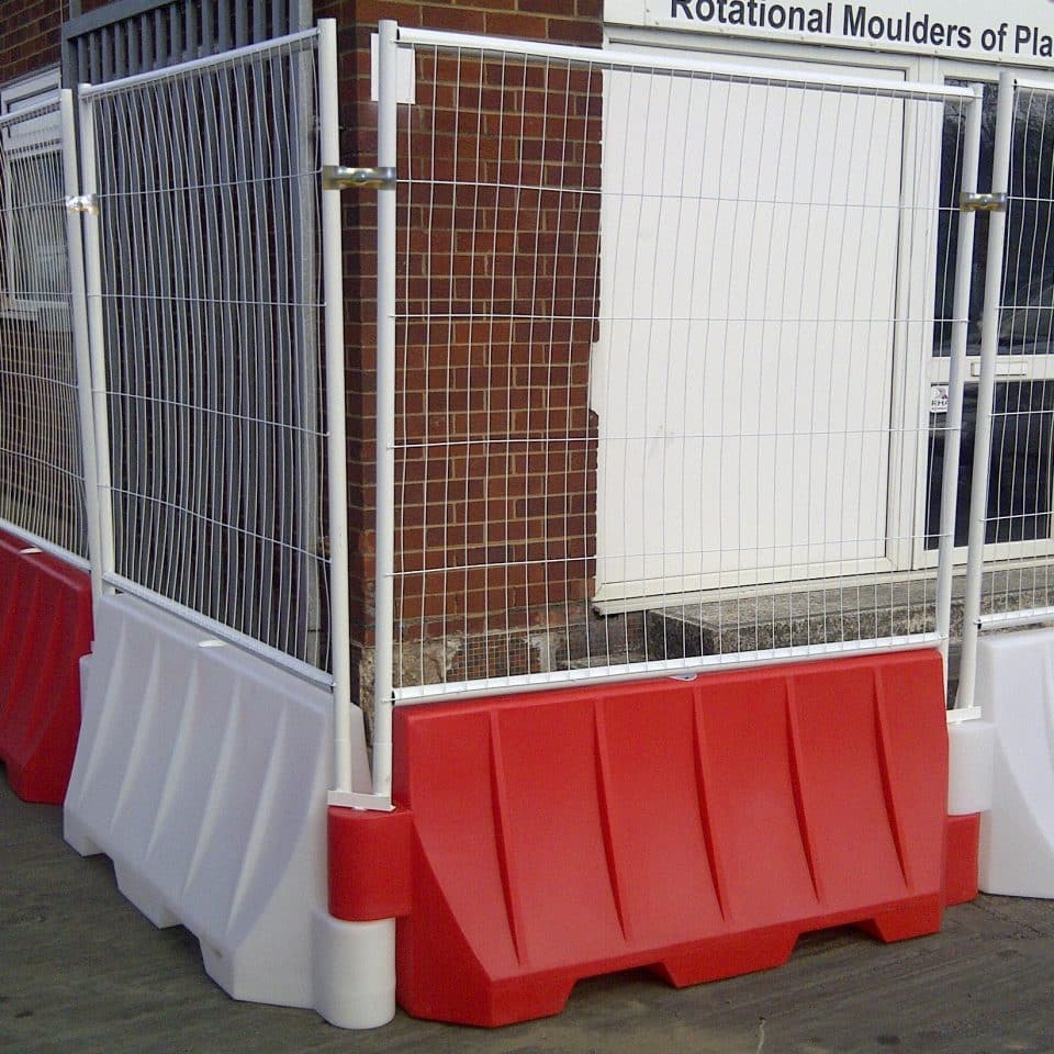 red and white barrier fence corner